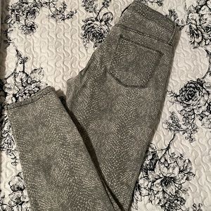 Mid rise snake print skinny jeans